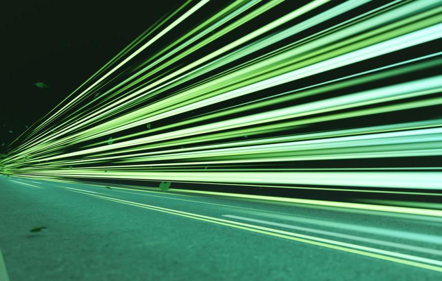 Green speed light trail on road with leaves, renewable energy highway transportation concept, clean eco power car street light at night, zero emission electric vehicle technology 3d rendering